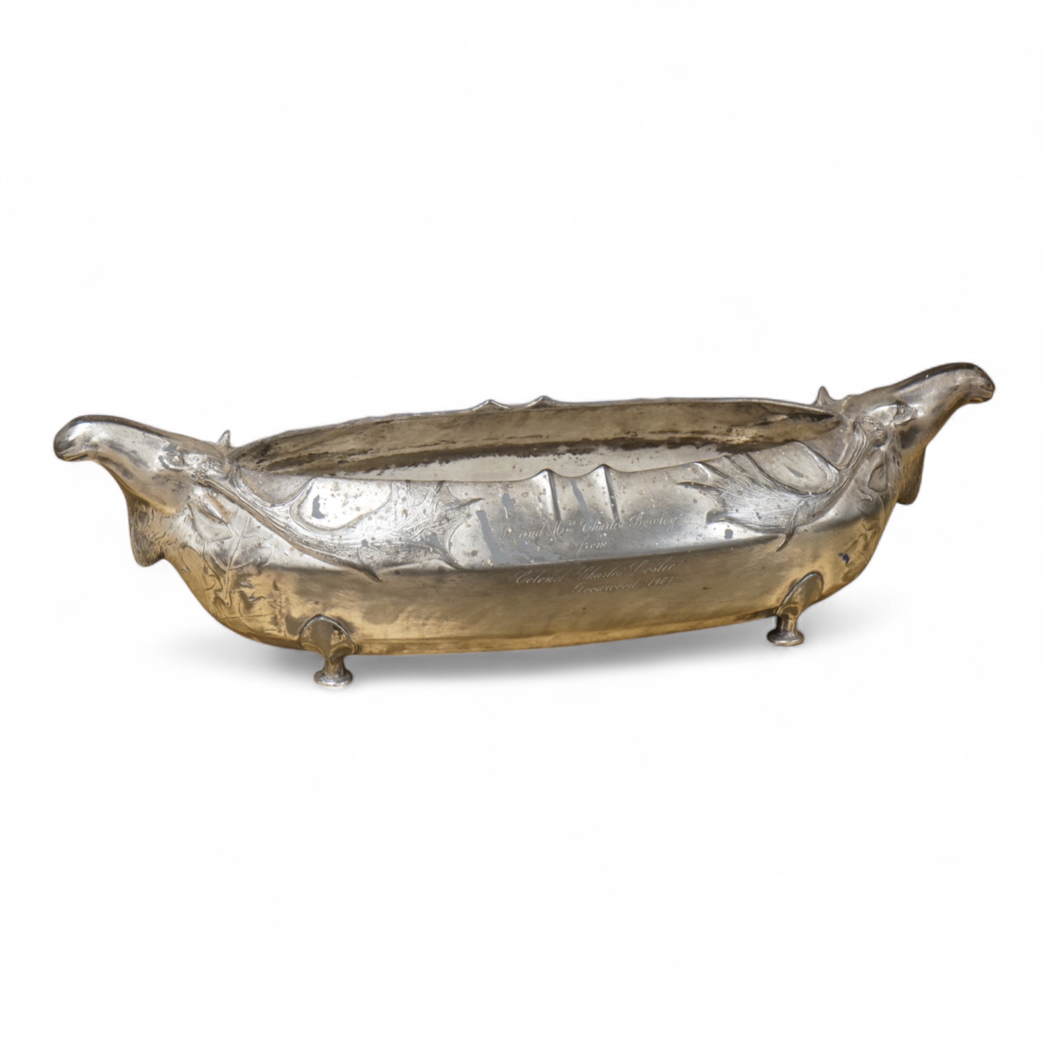 A Kayserzinn Versilbert ‘moose’ centrepiece with presentation inscription dated 1907, 47cm wide